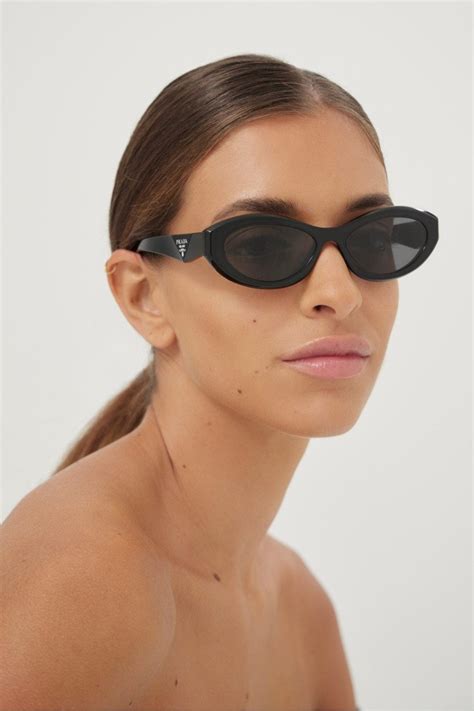 prada black oval sunglasses